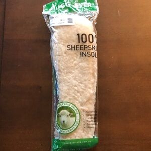 New in packaging- UGG 100% Sheepskin made in Australia, Adult Unisex size M12.